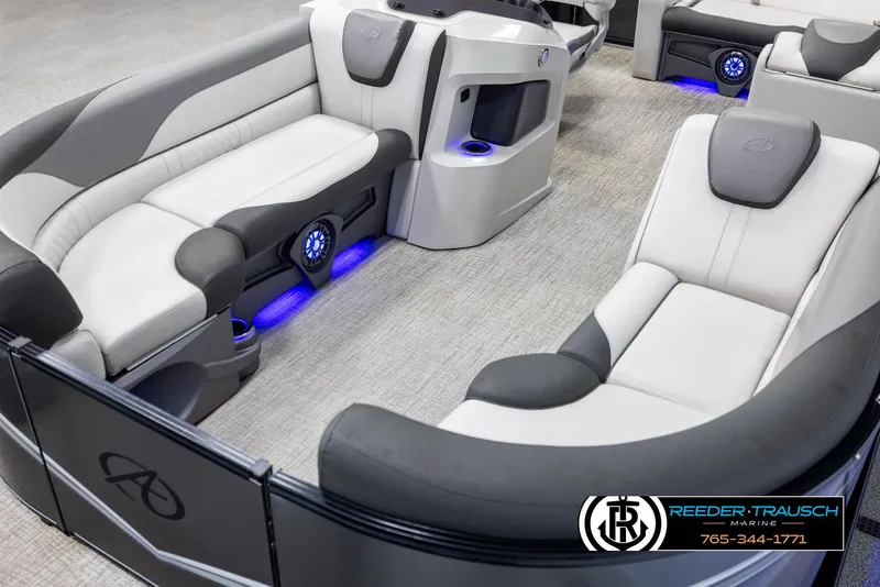 Slide: The Image of Luxurious 2021 Avalon LSZ VRB pontoon boat interior with stylish seating and blue LED lighting. - 9