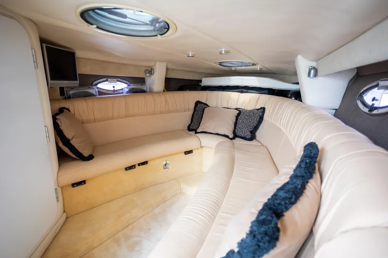 Slide: The Image of Luxurious interior of a 2005 Cobalt 343 boat with plush seating and elegant decor. - 20