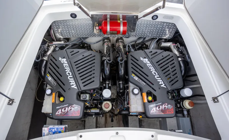 Slide: The Image of 2005 Cobalt 343 boat engine compartment with dual Mercury MerCruiser 496 MAG HO engines. - 24
