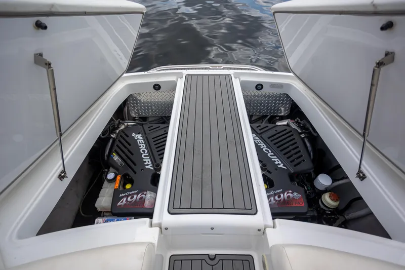 Slide: The Image of 2005 Cobalt 343 boat engine compartment with dual Mercury 496 engines. - 25