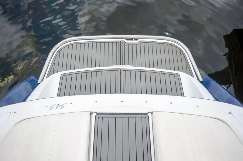 Slide: The Image of Rear view of a 2005 Cobalt 343 boat with sleek deck design. - 27