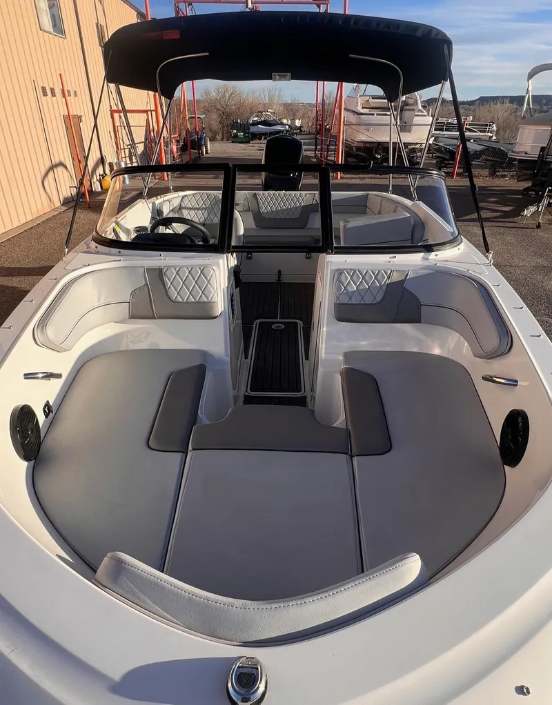 Slide: The Image of 2024 Bayliner VR40B boat with spacious seating and sleek design. - 4