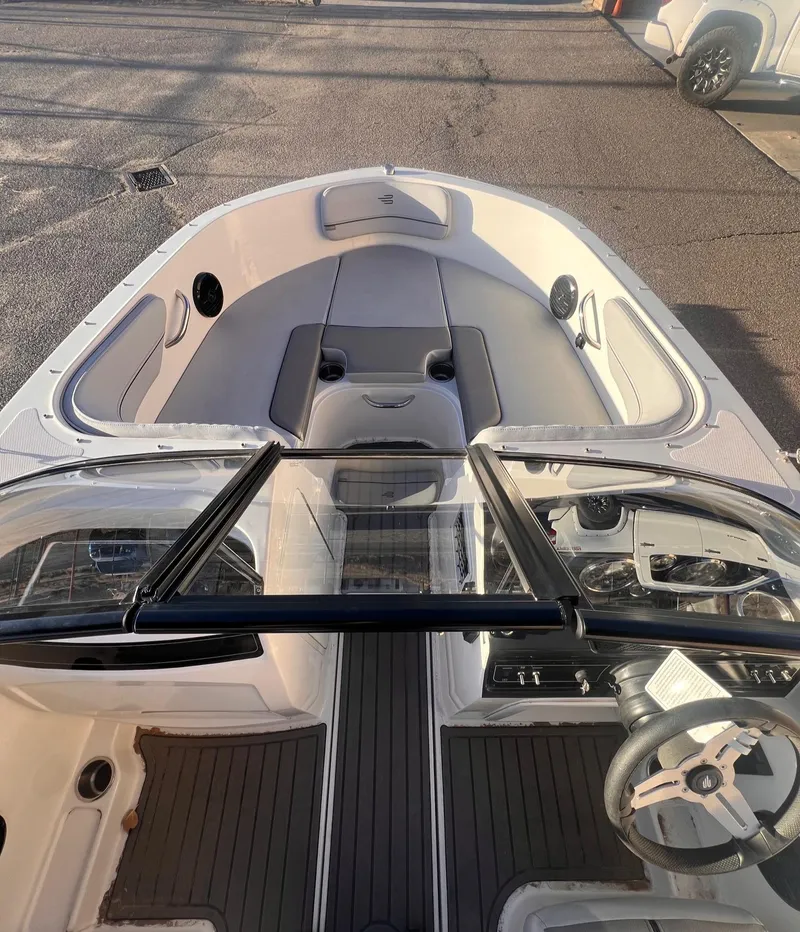 Slide: The Image of 2024 Bayliner VR40B boat interior with sleek design and modern dashboard. - 8