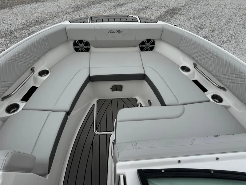 Slide: The Image of 2025 Sea Ray SDX 250 boat interior with spacious seating and modern design. - 17