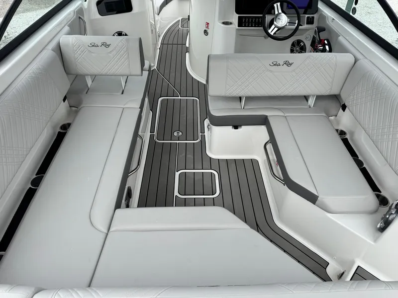 Slide: The Image of 2025 Sea Ray SDX 250 boat interior with sleek seating and modern design. - 9