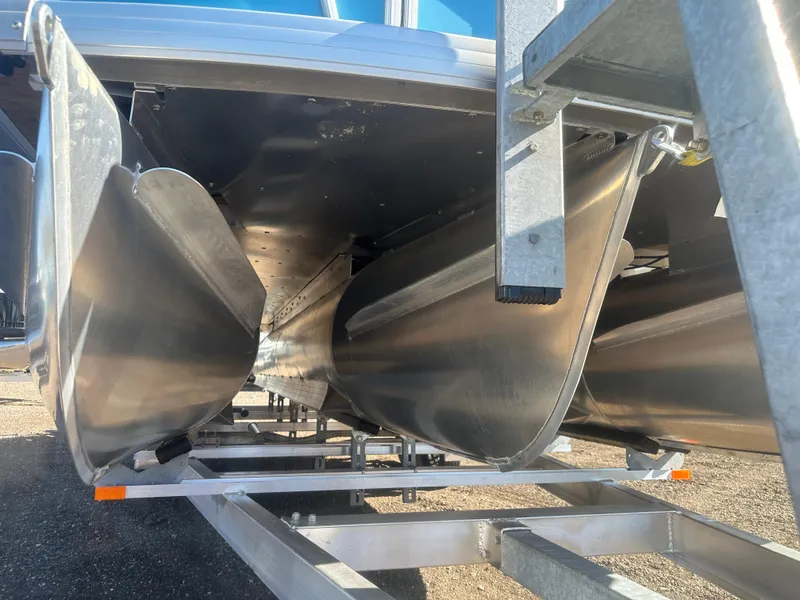 Slide: The Image of 2025 Godfrey Monaco 235 DFL Tritoon underside view on trailer. - 11