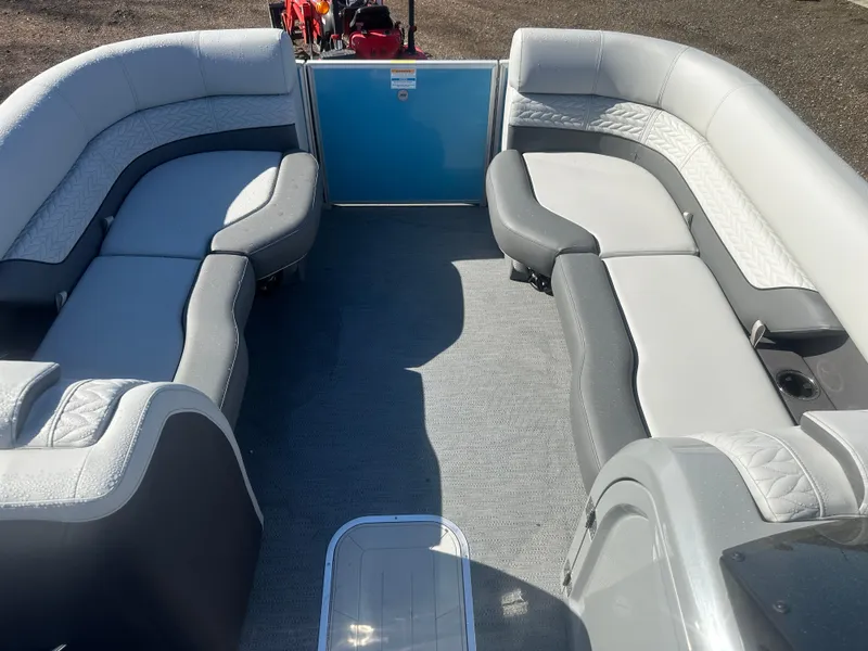 Slide: The Image of 2025 Godfrey Monaco 235 DFL Tritoon interior with spacious seating and modern design. - 12