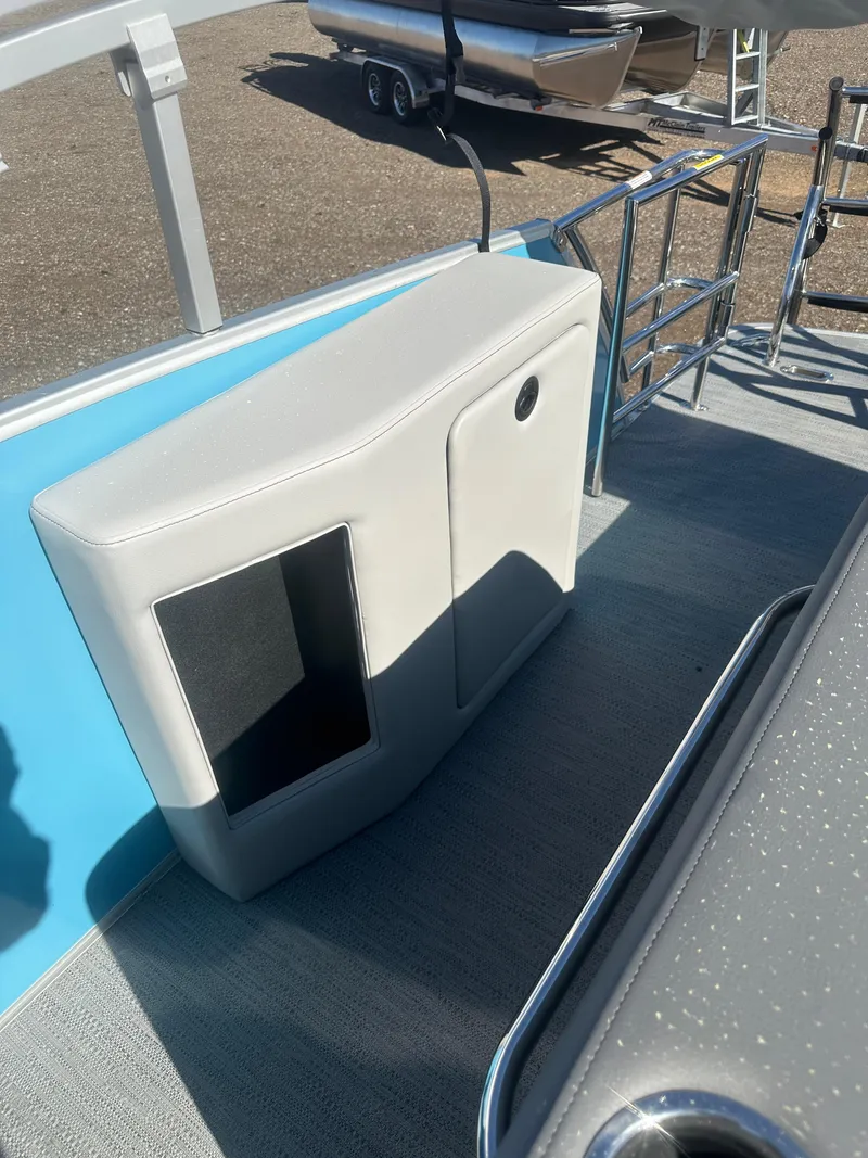 Slide: The Image of 2025 Godfrey Monaco 235 DFL Tritoon interior detail with seating and railing. - 24