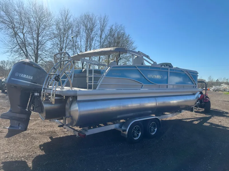 Slide: The Image of 2025 Godfrey Monaco 235 DFL Tritoon with Yamaha engine on trailer. - 6