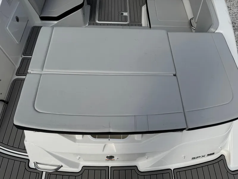 Slide: The Image of 2025 Sea Ray SPX 230 boat with sleek seating and modern design. - 7