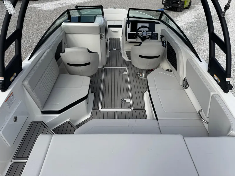 Slide: The Image of 2025 Sea Ray SPX 230 boat interior with modern seating and sleek design. - 8