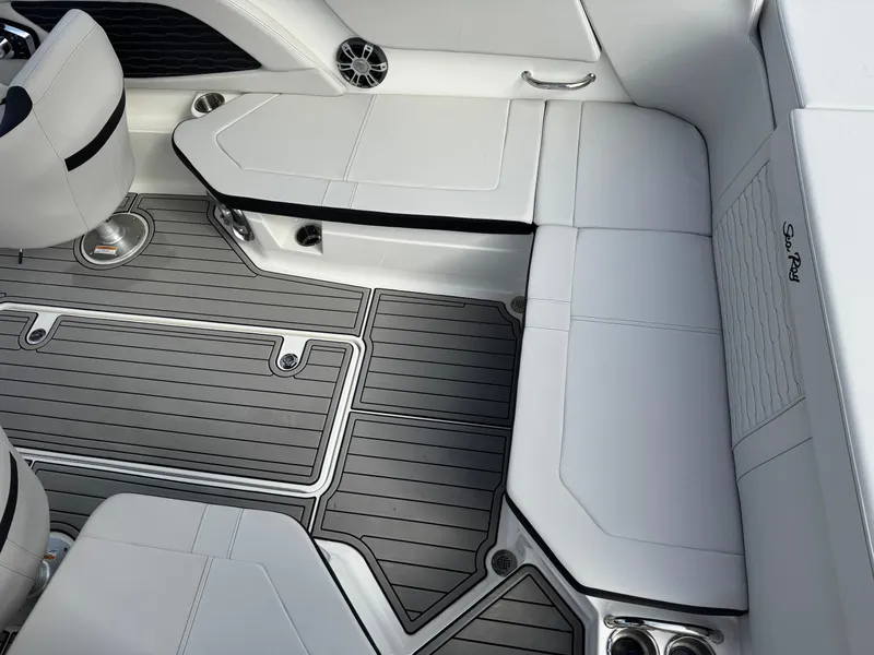 Slide: The Image of Interior of 2025 Sea Ray SPX 230 boat with sleek seating and modern design. - 9