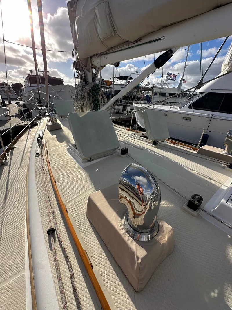 Slide: The Image of 1985 Shannon 43 Classic Cutter sailboat deck with polished fittings and rigging. - 25