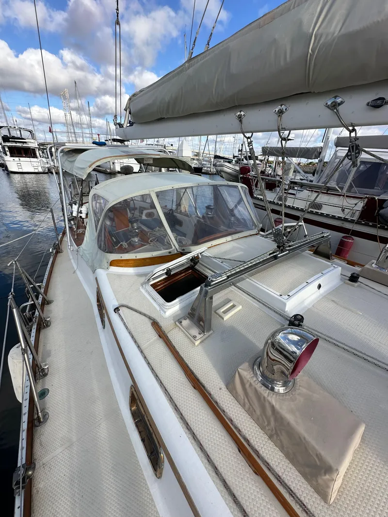Slide: The Image of 1985 Shannon 43 Classic Cutter sailboat docked, showcasing deck and rigging details. - 34