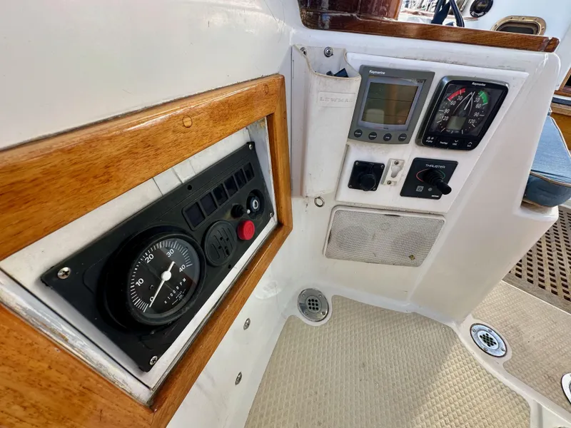 Slide: The Image of Control panel of a 1985 Shannon 43 Classic Cutter sailboat, featuring navigation instruments. - 41