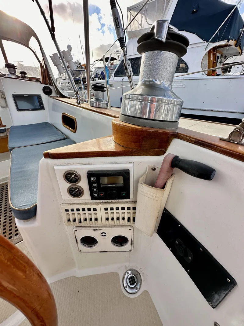 Slide: The Image of Cockpit of 1985 Shannon 43 Classic Cutter with navigation instruments and winch. - 42