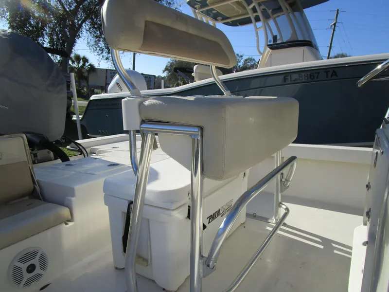 Slide: The Image of 2016 Pathfinder 2200 TRS boat interior with seating and console details. - 4
