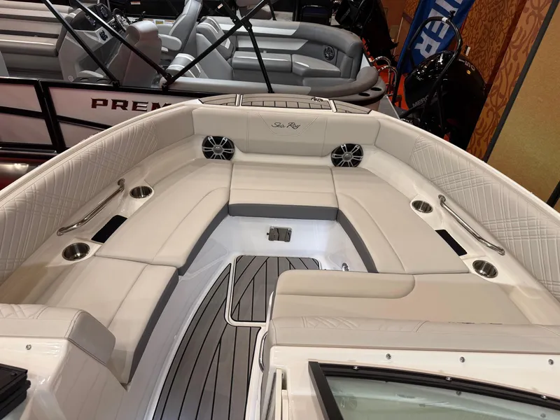 Slide: The Image of 2024 Sea Ray SLX 260 boat interior with luxurious seating and modern design. - 11
