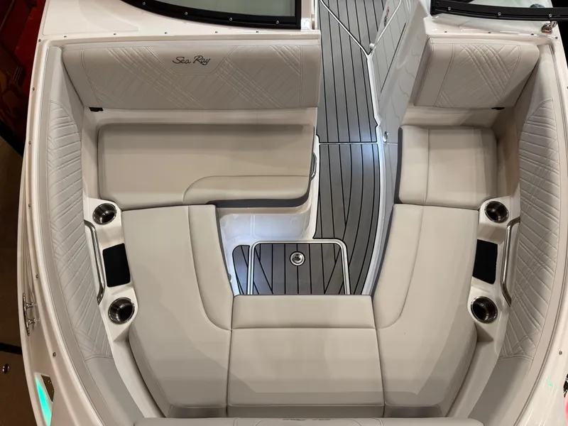Slide: The Image of 2024 Sea Ray SLX 260 boat interior with luxurious seating and modern design. - 12