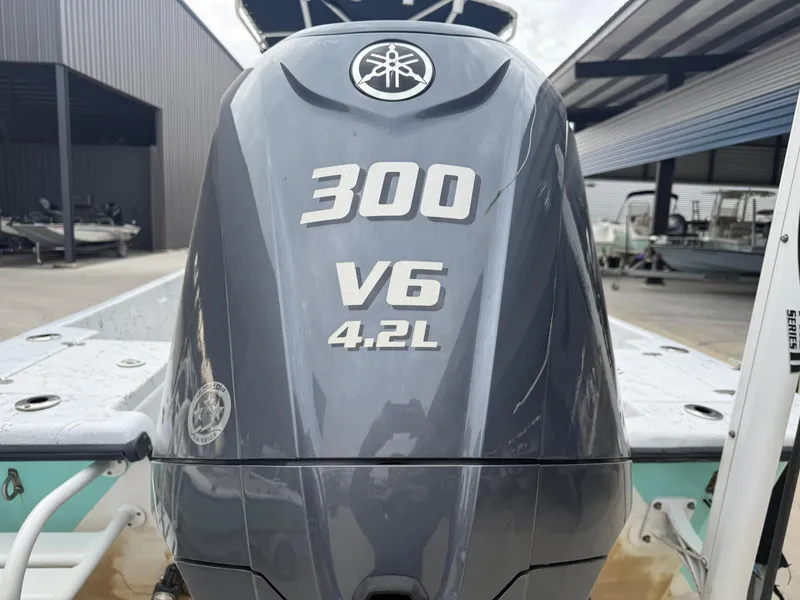Slide: The Image of Yamaha 300 V6 4.2L outboard engine on a 2012 Blazer 2400 boat. - 17