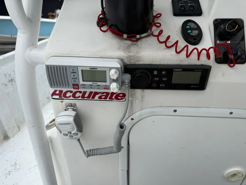 Slide: The Image of Boat console with Uniden radio and Fusion MS-RA70, Blazer 2400, 2012 model. - 4