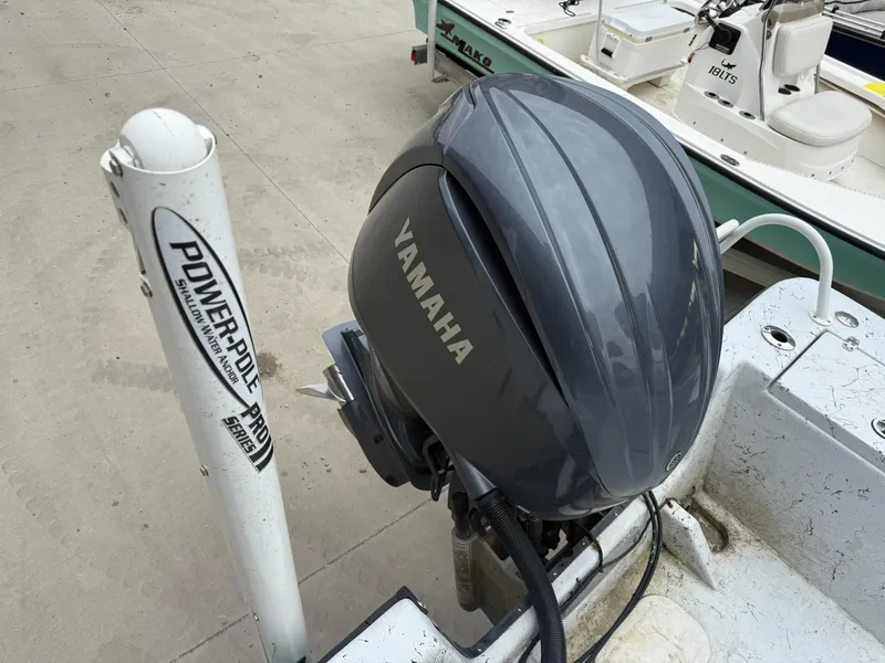 Slide: The Image of 2012 Blazer 2400 boat with Yamaha outboard motor and Power-Pole anchor. - 6