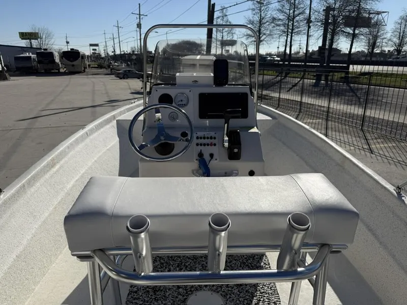 Slide: The Image of 2011 NauticStar 190R RG boat interior with steering console and seating. - 3