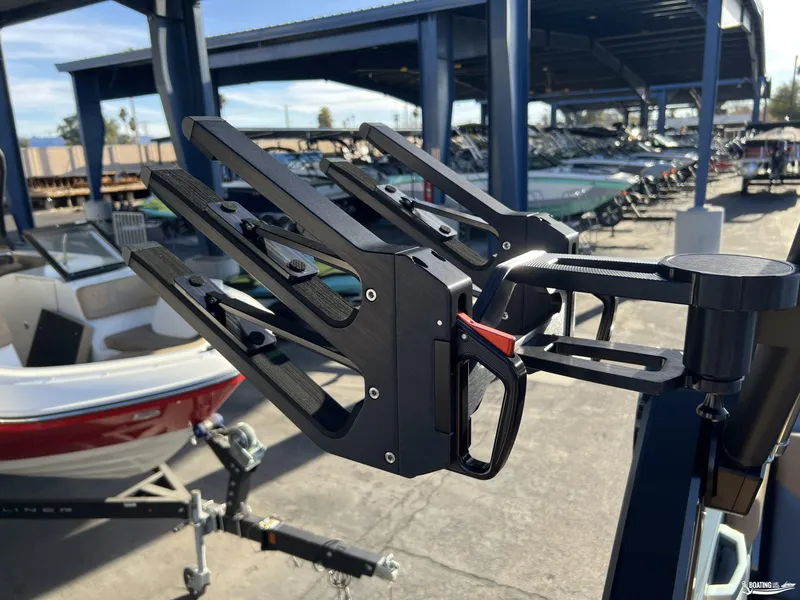 Slide: The Image of 2025 MasterCraft XT25 boat accessory detail in a marina setting. - 24