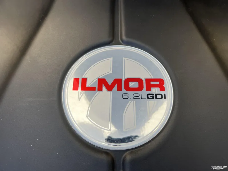 Slide: The Image of Ilmor 6.2L GDI engine badge on 2025 MasterCraft XT25 boat. - 28