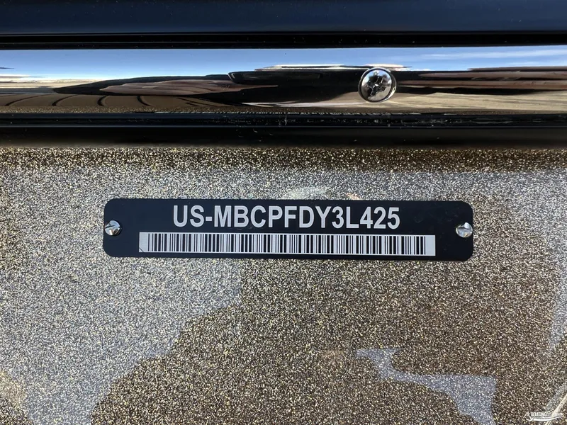 Slide: The Image of 2025 MasterCraft XT25 boat identification plate with serial number and barcode. - 30