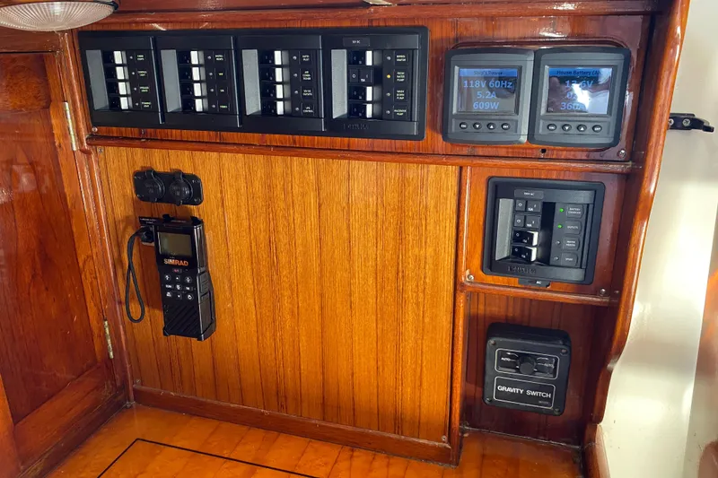 Slide: The Image of Electrical control panel on a 1962 Cheoy Lee Custom yacht with wood finish. - 24