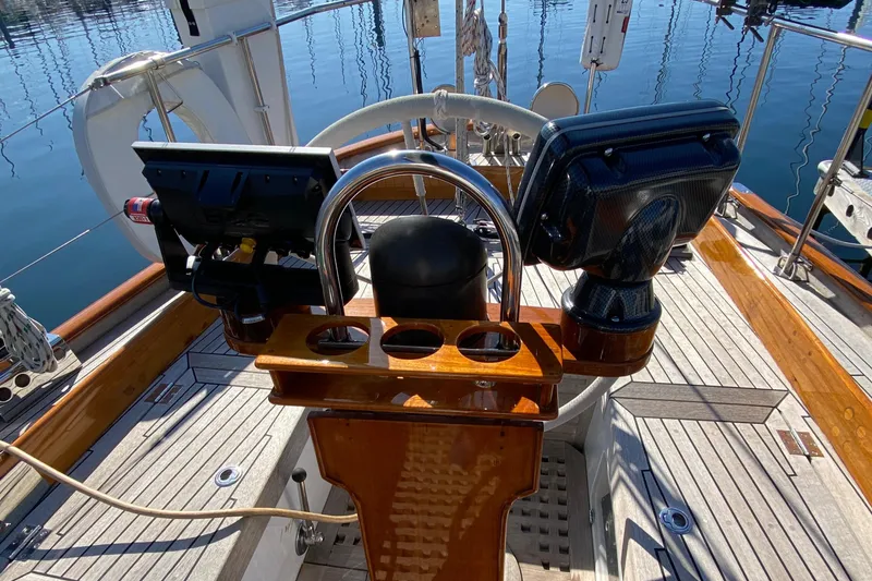 Slide: The Image of 1962 Cheoy Lee Custom yacht helm with wooden deck and navigation equipment. - 41