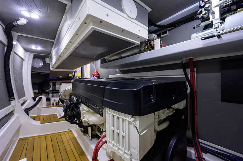 Slide: The Image of Engine room of 2026 Grand Banks GB 85 yacht, featuring modern equipment and design. - 29