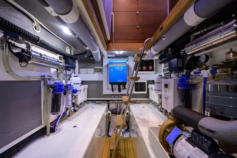 Slide: The Image of Engine room of 2026 Grand Banks GB 85 yacht, showcasing advanced equipment and systems. - 26