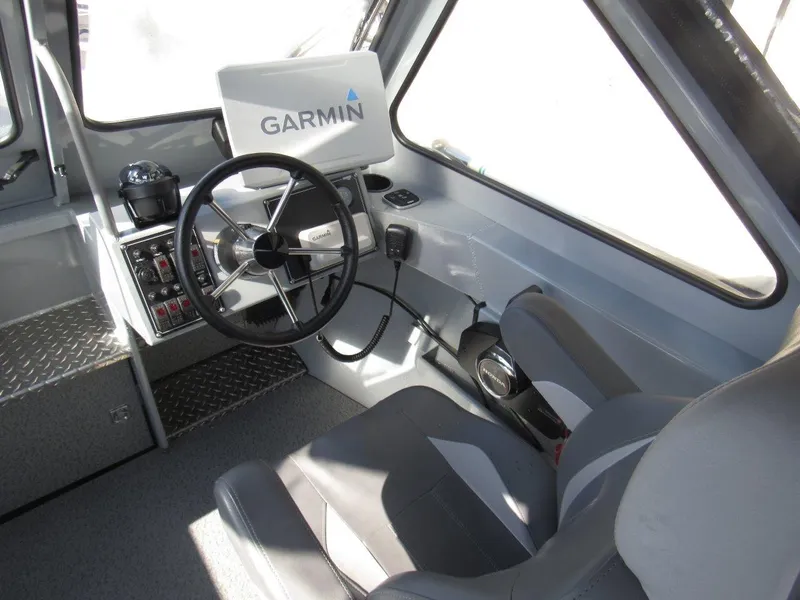 Slide: The Image of Interior of 2023 Hewescraft 210 Sea Runner ET with Garmin navigation system. - 12