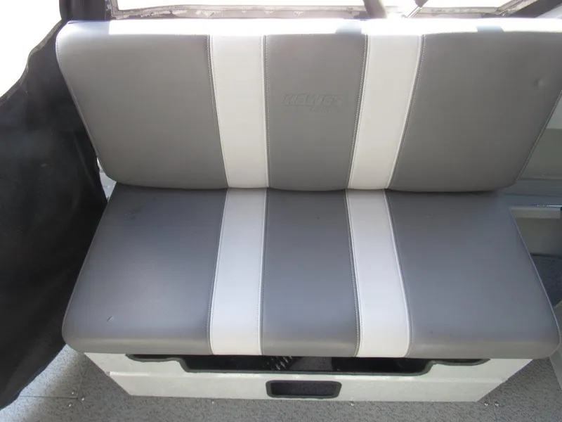 Slide: The Image of 2023 Hewescraft 210 Sea Runner ET boat seat, gray and white upholstery. - 14