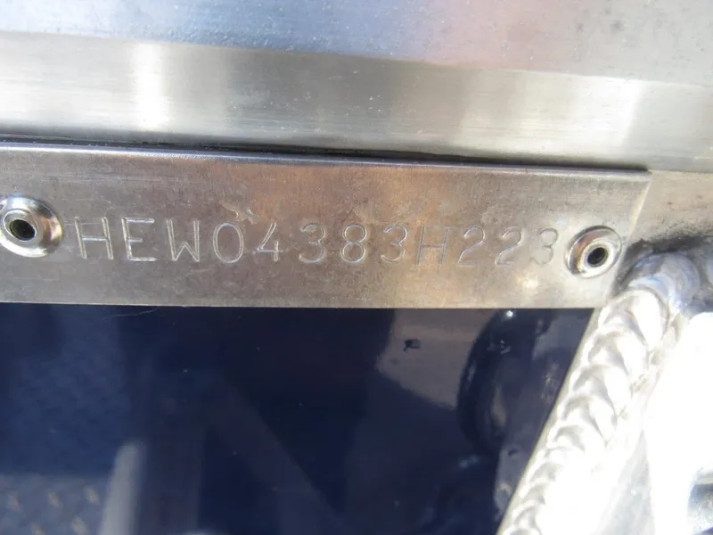 Slide: The Image of Hewescraft 210 Sea Runner ET 2023 hull identification number plate. - 18