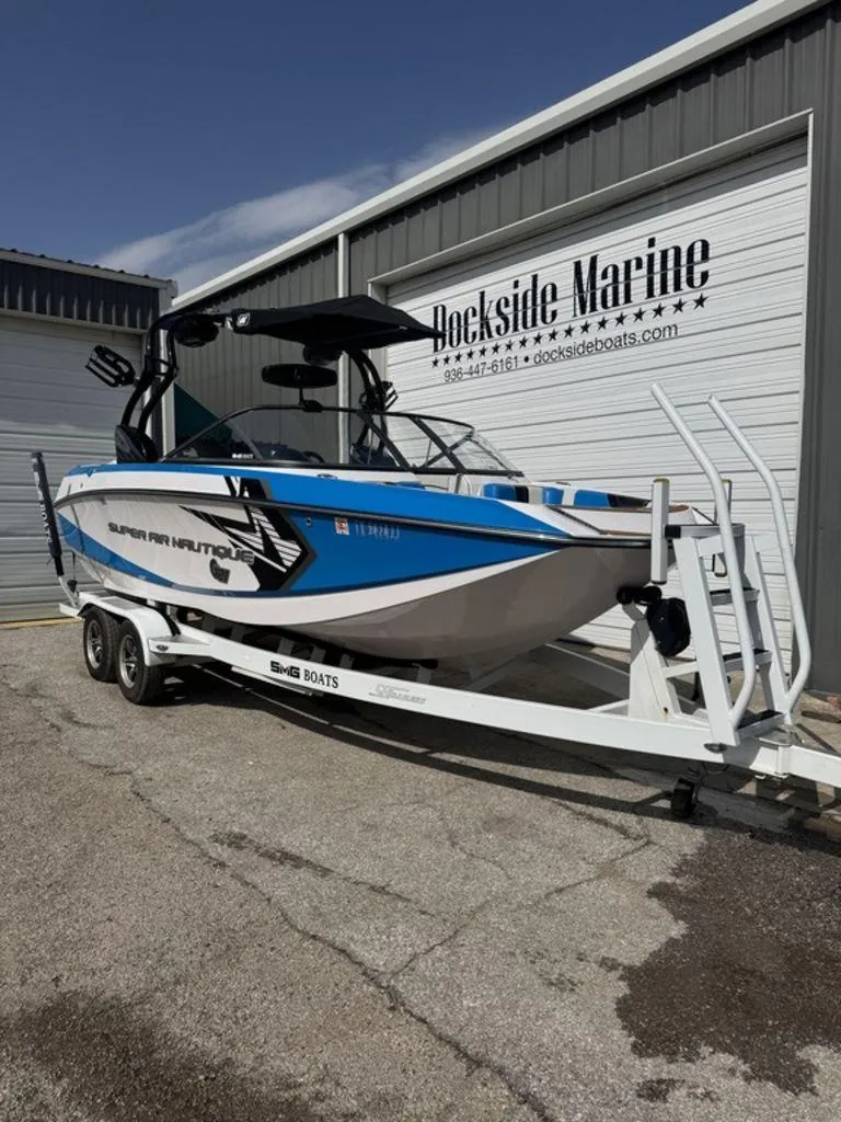 Slide: The Image of 2015 Nautique G21 boat on trailer at Dockside Marine. - 2