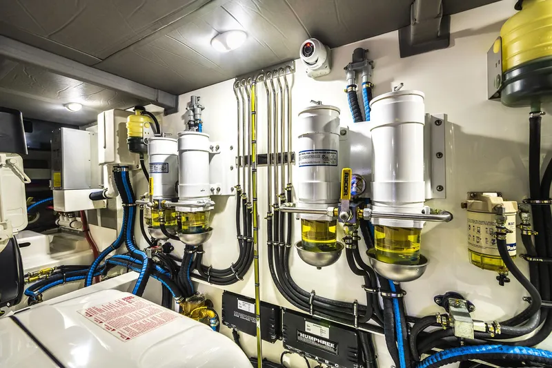 Slide: The Image of Engine room of 2026 Grand Banks GB 60 yacht, showcasing advanced filtration systems. - 14