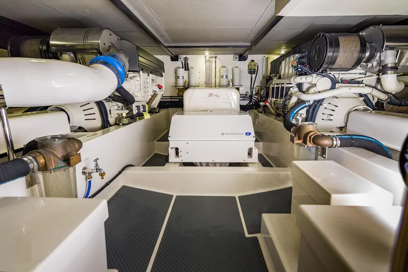 Slide: The Image of Engine room of 2026 Grand Banks GB 60 yacht, showcasing advanced machinery and equipment. - 18