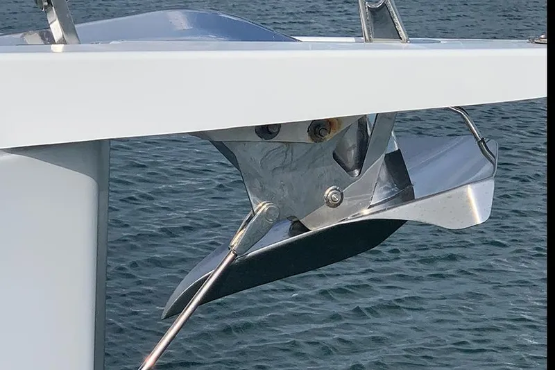 Slide: The Image of Anchor of 2019 Jeanneau Sun Odyssey 490 sailboat over water. - 11
