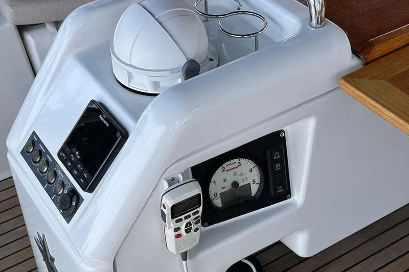 Slide: The Image of Control panel of 2019 Jeanneau Sun Odyssey 490 sailboat with navigation instruments. - 13