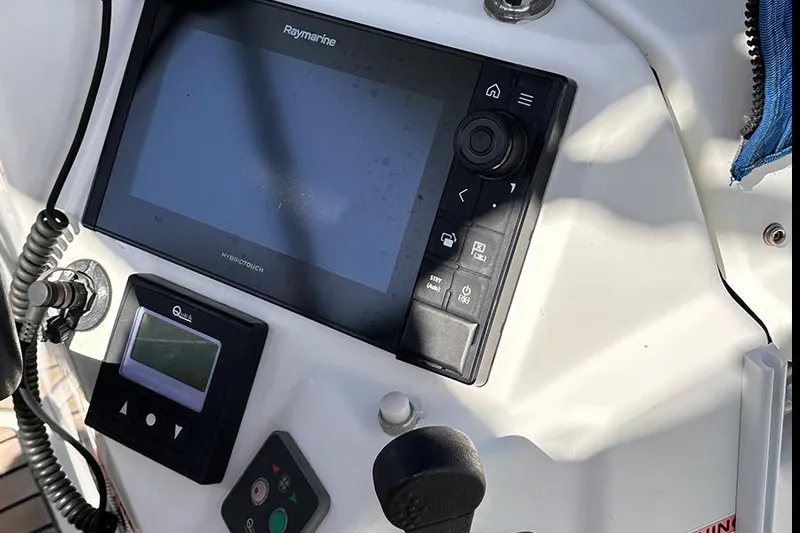 Slide: The Image of Control panel of 2019 Jeanneau Sun Odyssey 490 sailboat with navigation equipment. - 14
