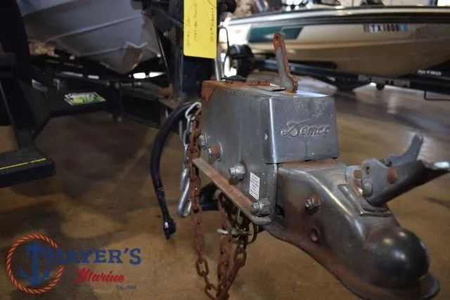 Slide: The Image of Trailer hitch of a 1997 ProCraft 180 boat at Thayer's Marine showroom. - 23