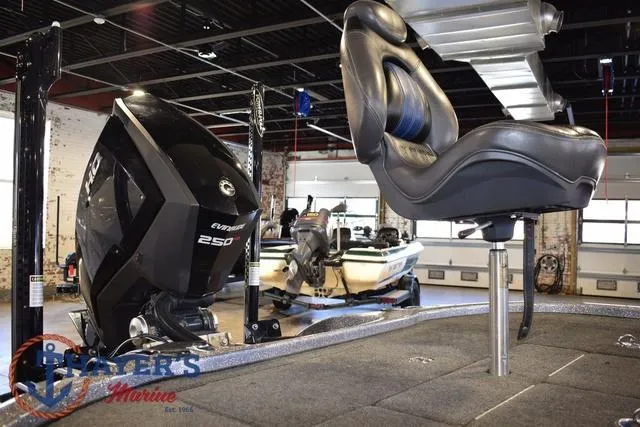 Slide: The Image of 2011 Ranger Z520C boat with Evinrude 250 engine in showroom. - 13