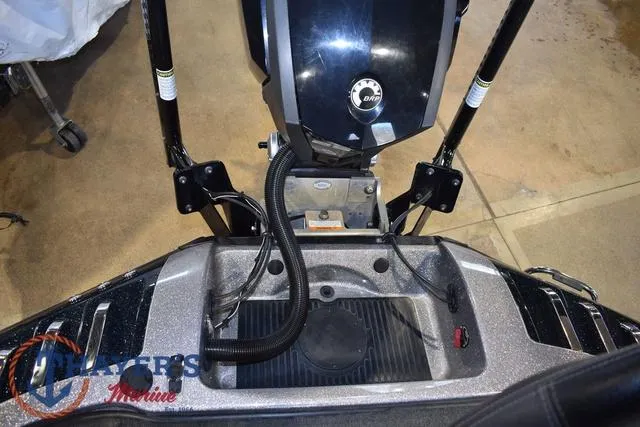 Slide: The Image of 2011 Ranger Z520C boat engine compartment with visible wiring and components. - 32