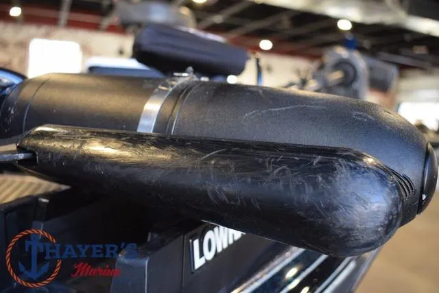 Slide: The Image of Close-up of a 2011 Ranger Z520C boat component with visible wear and Thayer's Marine logo. - 34