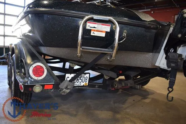 Slide: The Image of 2011 Ranger Z520C boat trailer rear view in garage setting. - 37