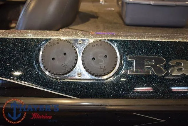 Slide: The Image of 2011 Ranger Z520C boat detail with dual gas caps and Thayer's Marine logo. - 38