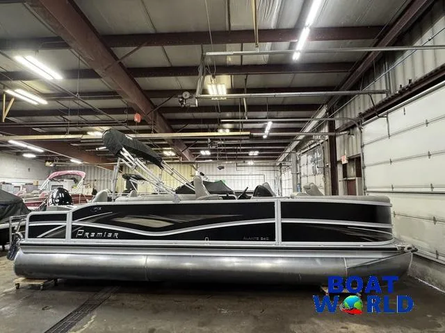 Slide: The Image of 2019 Premier Alante 240 DL pontoon boat in a warehouse setting. - 12